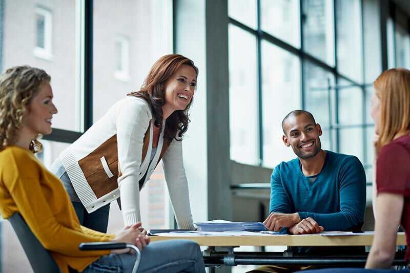 Smiling-coworkers-in-meeting (1)
