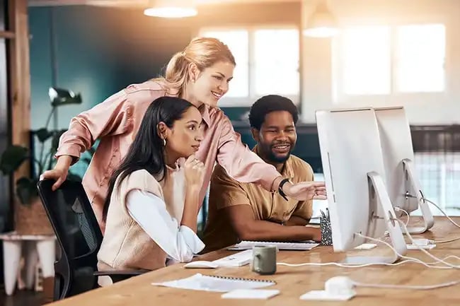 three-professionals-at-computer-1_11zon